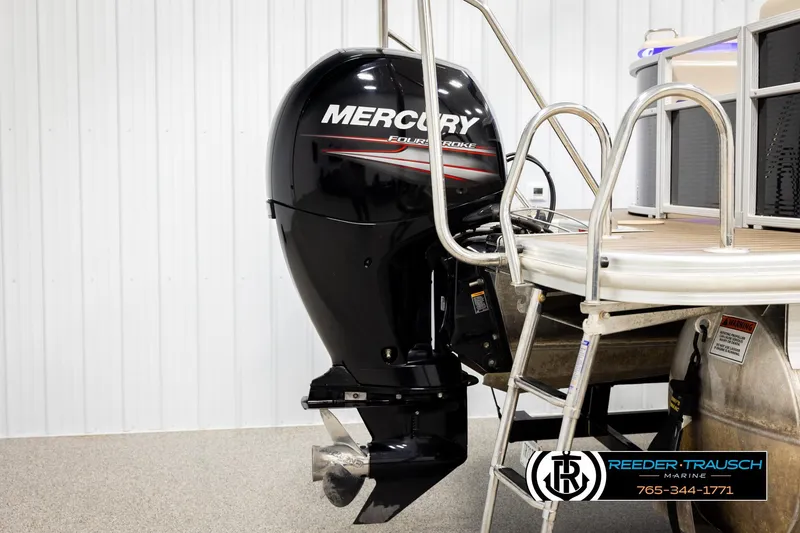 Slide: The Image of 2016 Bennington 24 SPDXDF with Mercury outboard motor in showroom. - 47