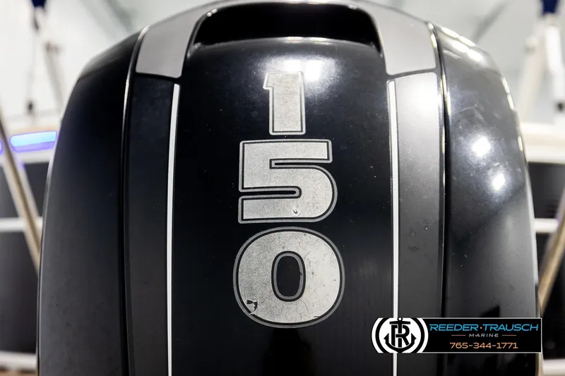 Slide: The Image of Close-up of a 150 HP outboard motor on a 2016 Bennington 24 SPDXDF boat. - 49