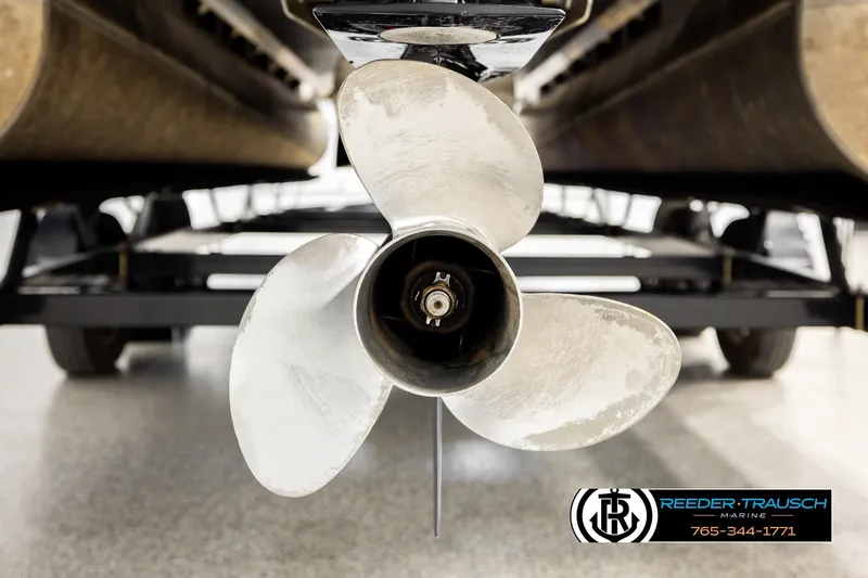 Slide: The Image of Close-up of a 2016 Bennington 24 SPDXDF boat propeller on a trailer. - 50