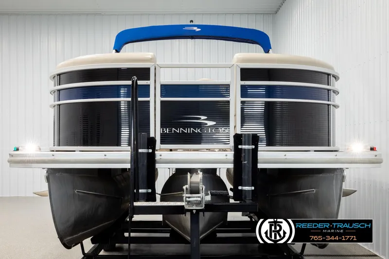 Slide: The Image of 2016 Bennington 24 SPDXDF pontoon boat in showroom, front view. - 8