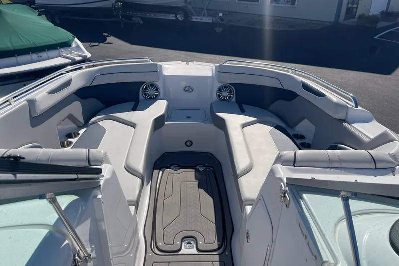 Slide: The Image of 2023 Hurricane SunDeck 2400 OB boat interior with spacious seating and modern design. - 26