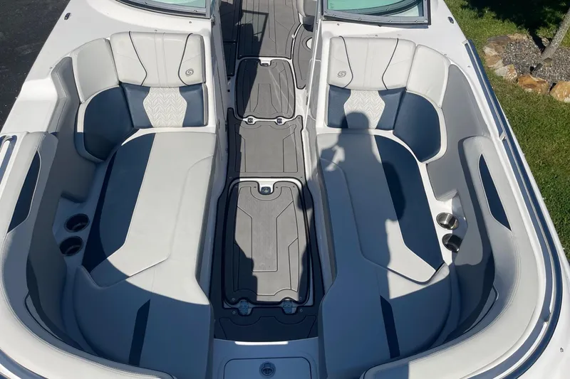 Slide: The Image of 2023 Hurricane SunDeck 2400 OB boat interior with spacious seating and modern design. - 33