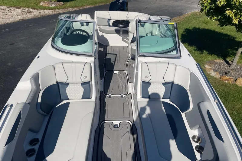 Slide: The Image of 2023 Hurricane SunDeck 2400 OB boat interior with spacious seating and modern design. - 34