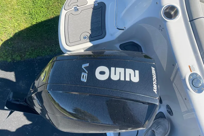 Slide: The Image of 2023 Hurricane SunDeck 2400 OB with Mercury V8 outboard engine, top view. - 6