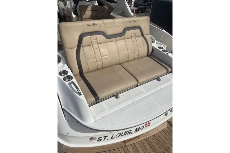 Slide: The Image of 2016 Sea Ray 350 SLX boat with beige seating, docked in St. Louis, MO. - 26