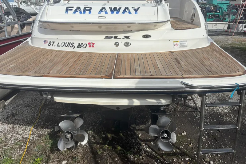 Slide: The Image of Rear view of 2016 Sea Ray 350 SLX boat with wooden deck, docked in St. Louis, MO. - 28