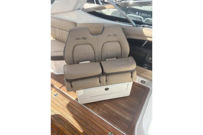 Slide: The Image of Luxurious seating on 2016 Sea Ray 350 SLX boat with elegant wood flooring. - 9