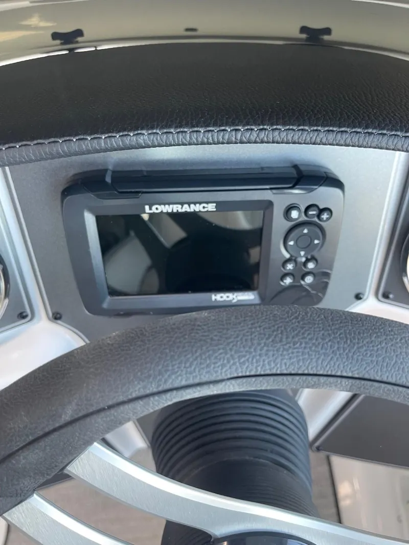 Slide: The Image of 2023 Hurricane SunDeck Sport 192 RL OB dashboard with Lowrance navigation system. - 12