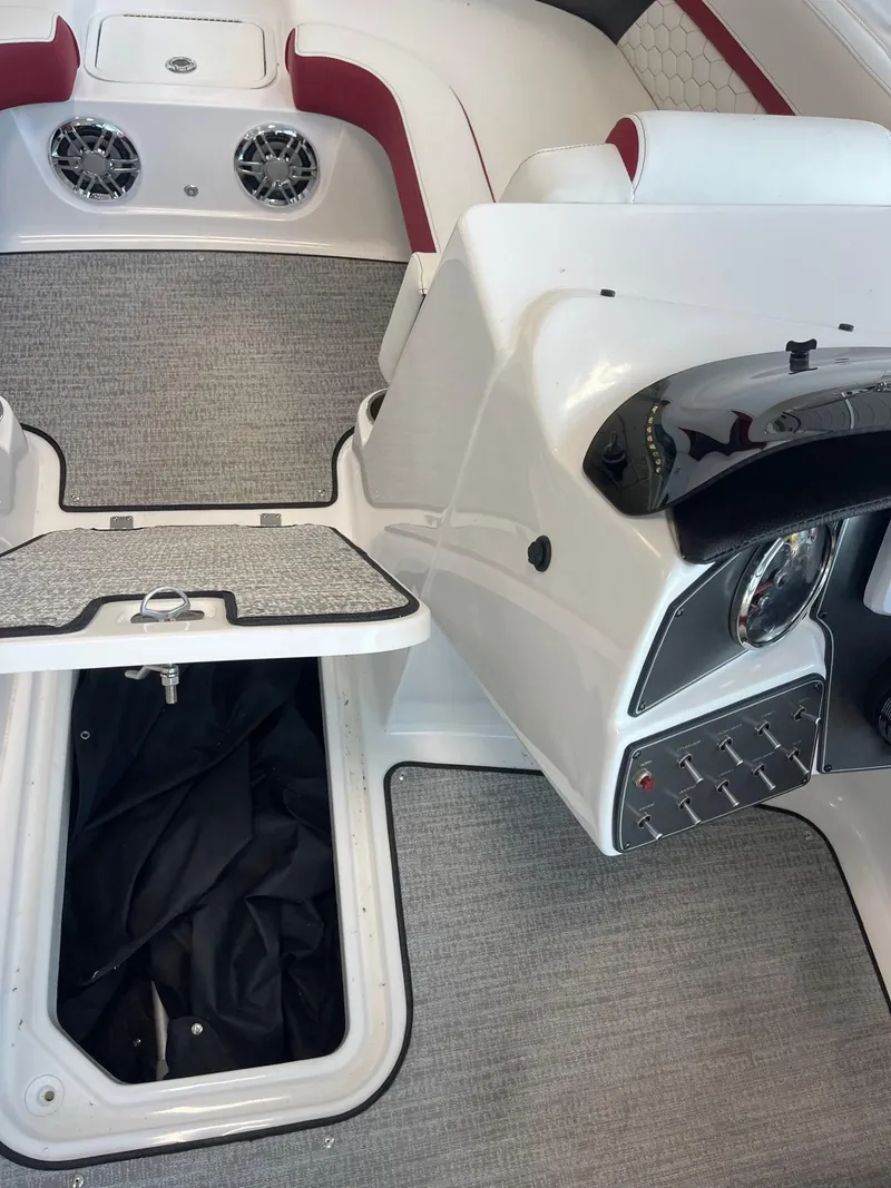 Slide: The Image of 2023 Hurricane SunDeck Sport 192 RL OB boat interior with storage compartment open. - 15