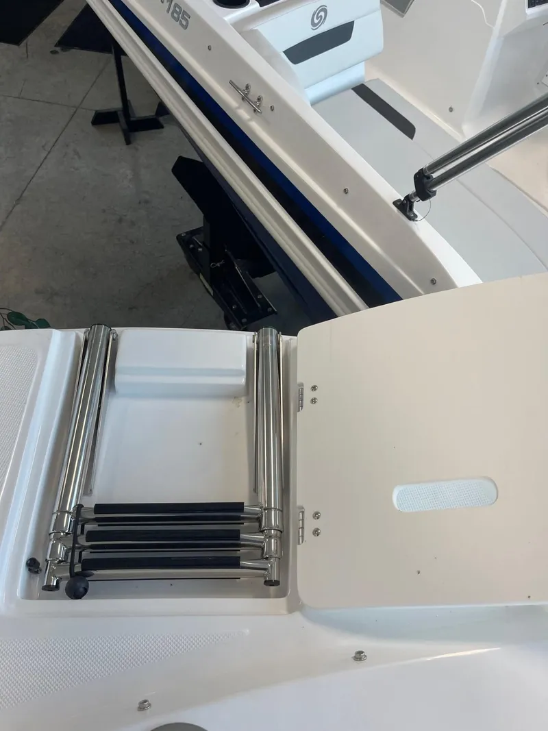 Slide: The Image of 2023 Hurricane SunDeck Sport 192 RL OB boat with foldable stainless steel ladder. - 16