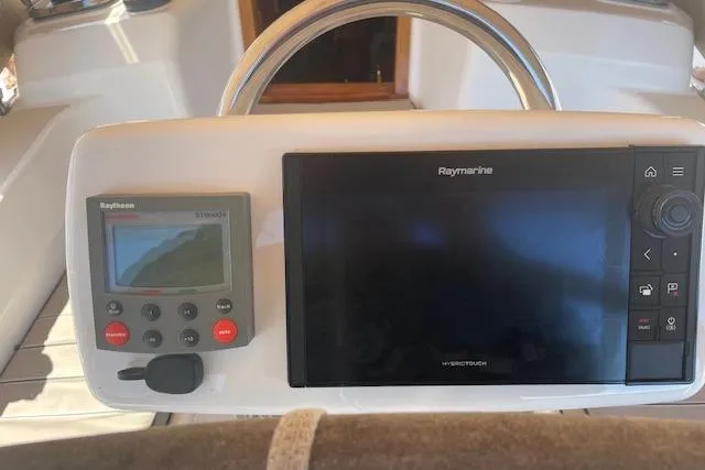 Slide: The Image of Steering console of 2001 Tartan 3700 with Raymarine navigation system. - 23