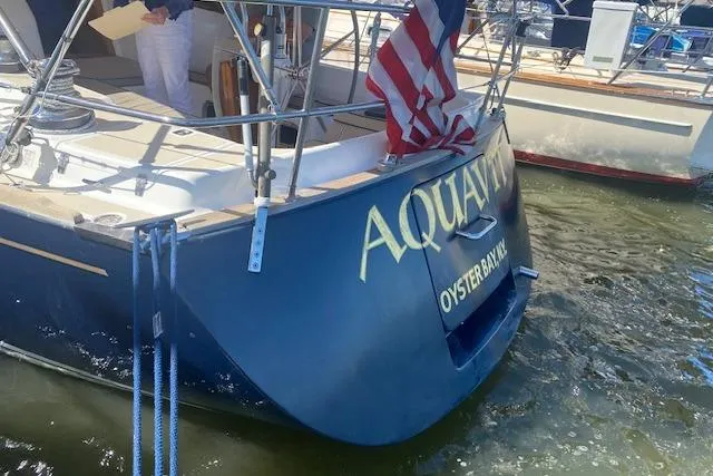 Slide: The Image of Tartan 3700 sailboat from 2001 named "AQUAVIT" docked at Oyster Bay. - 29