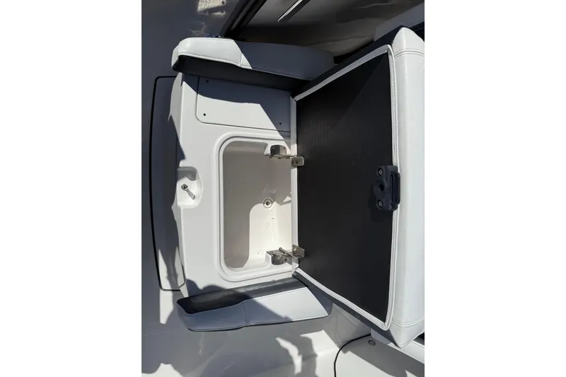 Slide: The Image of Open storage compartment on 2022 Blackfin 272 CC boat, showcasing interior space. - 6