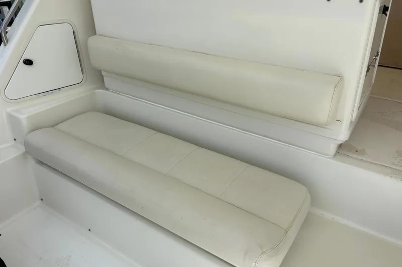 Slide: The Image of White seating area on a 1993 Tiara Yachts 43 Open boat. - 10