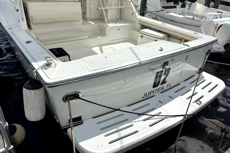 Slide: The Image of 1993 Tiara Yachts 43 Open docked in Jupiter, FL, rear view. - 12