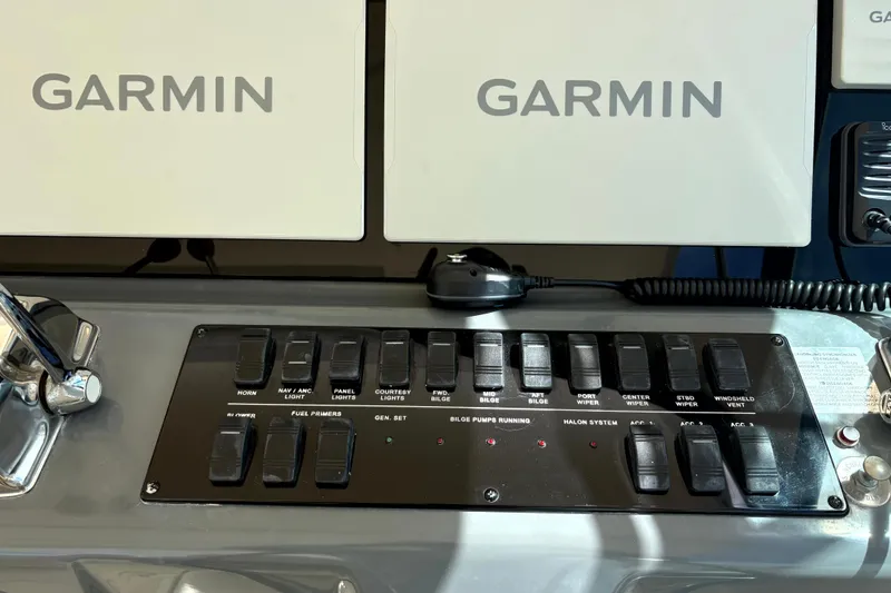 Slide: The Image of Control panel of a 1993 Tiara Yachts 43 Open with Garmin navigation systems. - 4