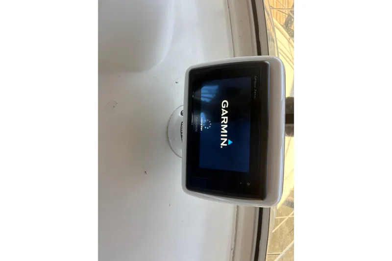 Slide: The Image of Garmin GPS device on 2007 Carver 42 Super Sport yacht dashboard. - 12