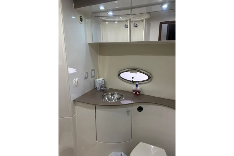 Slide: The Image of Luxurious bathroom interior of 2007 Carver 42 Super Sport yacht with modern fixtures. - 8