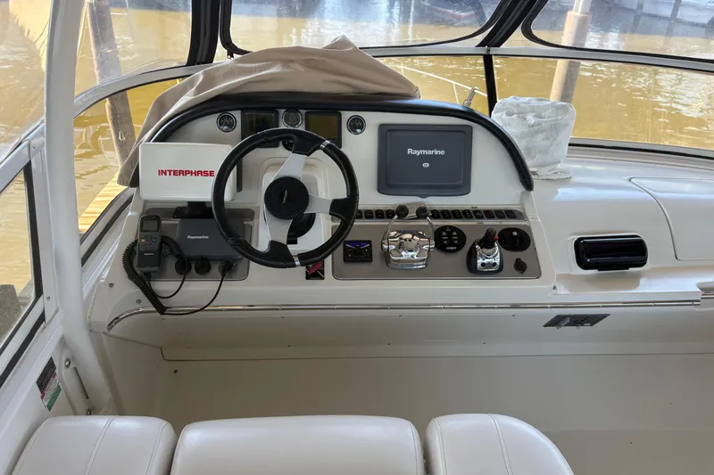 Slide: The Image of Helm of 2007 Carver 42 Super Sport with navigation equipment and steering wheel. - 18