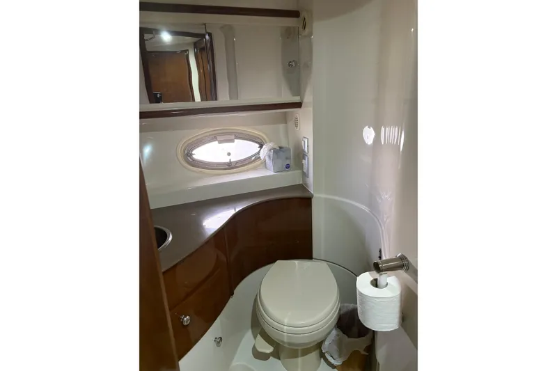 Slide: The Image of Bathroom interior of 2007 Carver 42 Super Sport yacht, featuring modern amenities. - 6