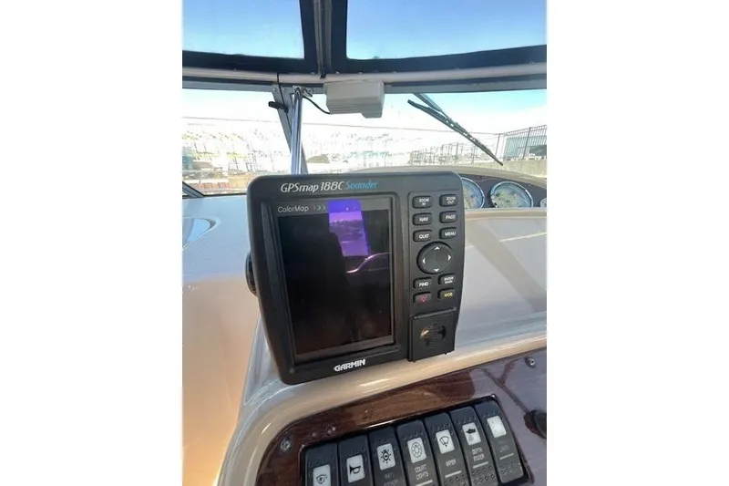 Slide: The Image of Garmin GPSmap 188C Sounder on 2005 Chaparral 290 Signature boat dashboard. - 13