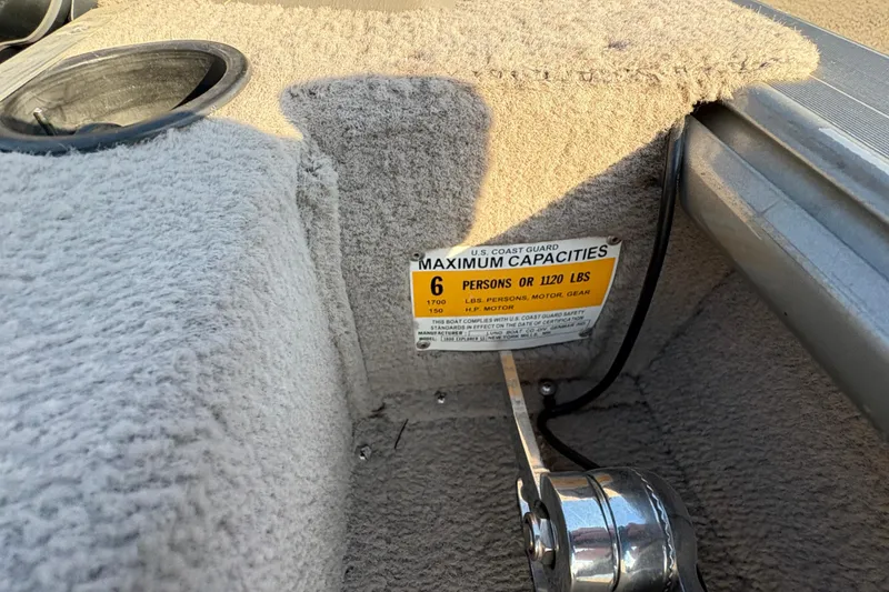 Slide: The Image of 2004 Lund 1800 Explorer SS boat capacity label, maximum 6 persons or 1120 lbs. - 20