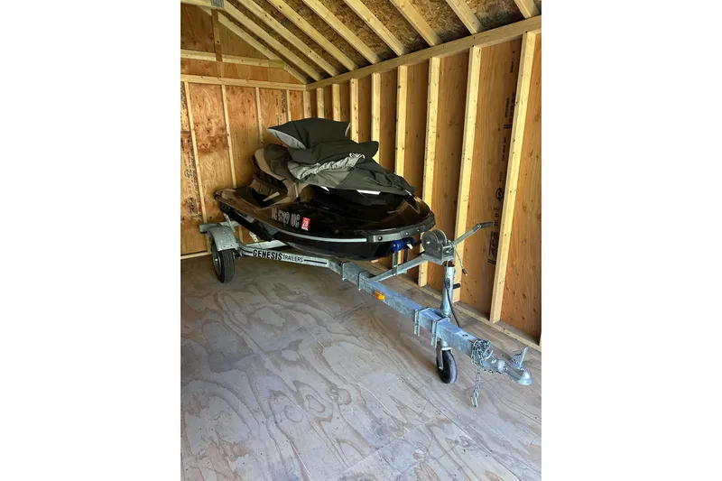 The Image of 2017 Yamaha WaveRunner EX Sport on trailer in wooden shed. - 6