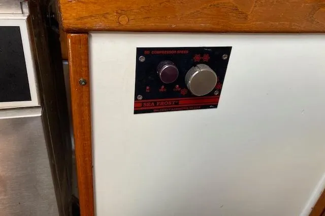 Slide: The Image of Control panel on a 1975 Tartan 41 sailboat with Sea Frost refrigeration system. - 21