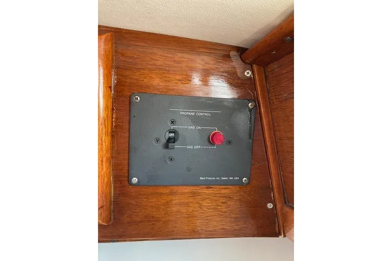 Slide: The Image of Propane control panel on 1975 Tartan 41 sailboat, featuring gas on/off switch. - 24