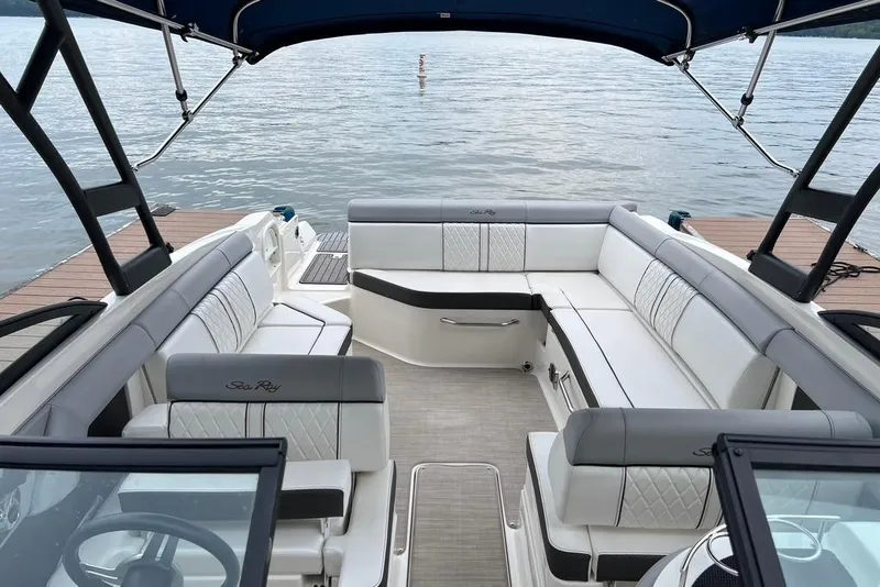 Slide: The Image of 2016 Sea Ray 270 Sundeck interior with spacious seating and lake view. - 6
