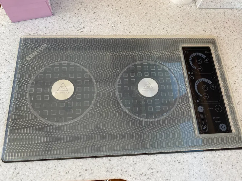 Slide: The Image of 2019 Sabre 45 Salon Express interior with elegant seating and wooden table. - 31