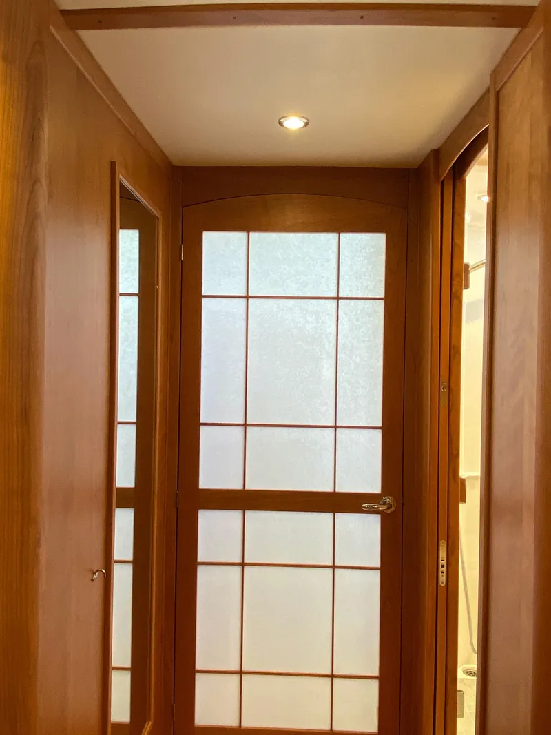 Slide: The Image of Luxurious bathroom in 2019 Sabre 45 Salon Express yacht with modern fixtures and wood cabinetry. - 39