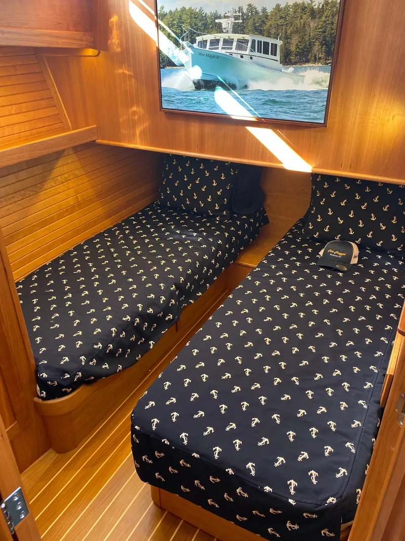 Slide: The Image of 2019 Sabre 45 Salon Express interior with wood paneling and mirror. - 42