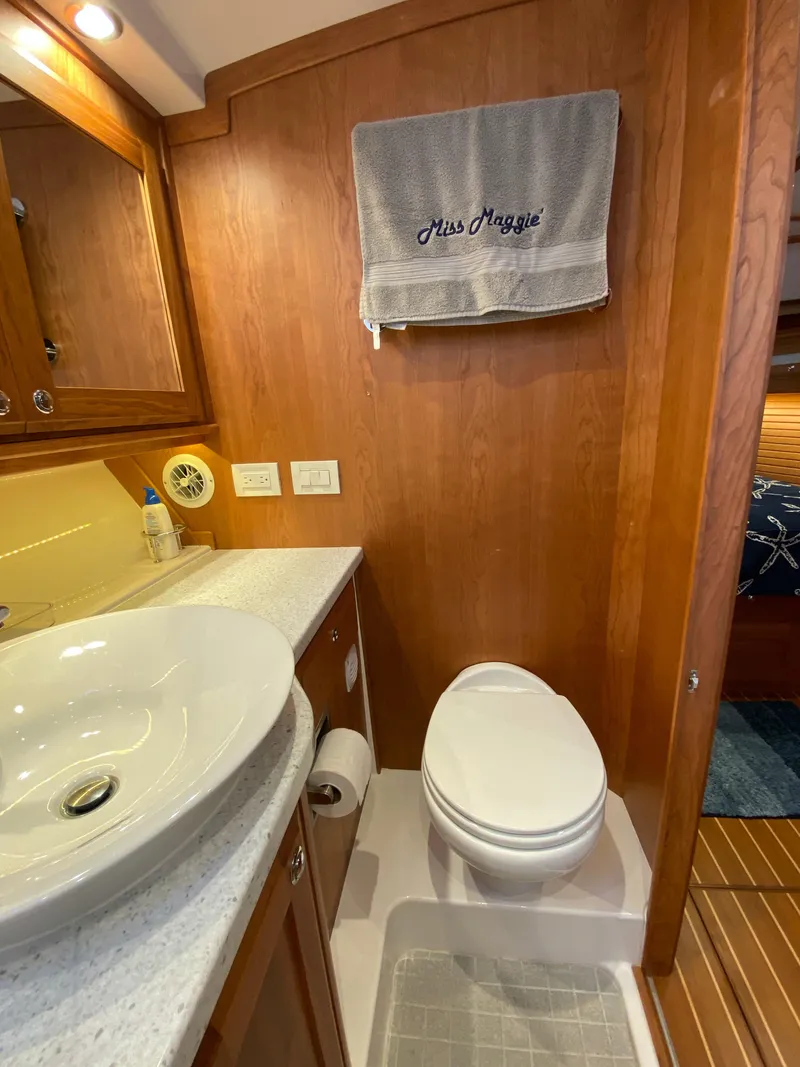 Slide: The Image of Interior of 2019 Sabre 45 Salon Express with wooden door and frosted glass. - 44