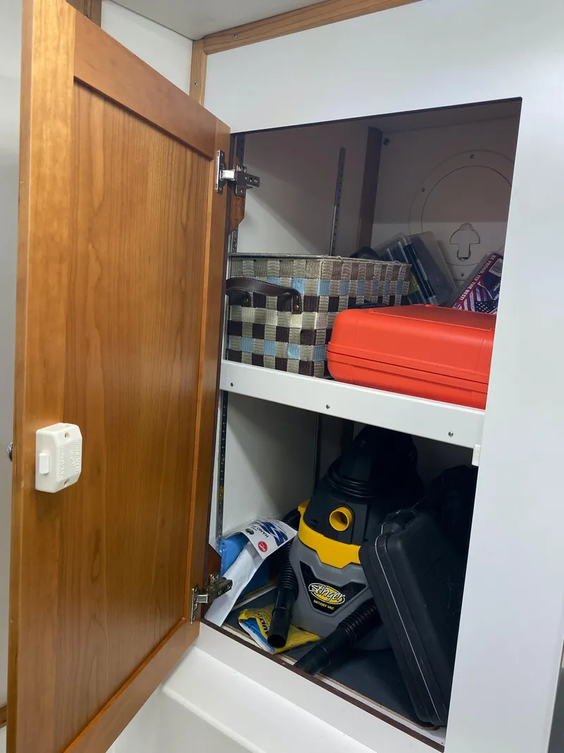 Slide: The Image of 2019 Sabre 45 Salon Express cabin with twin beds and nautical-themed bedding. - 47