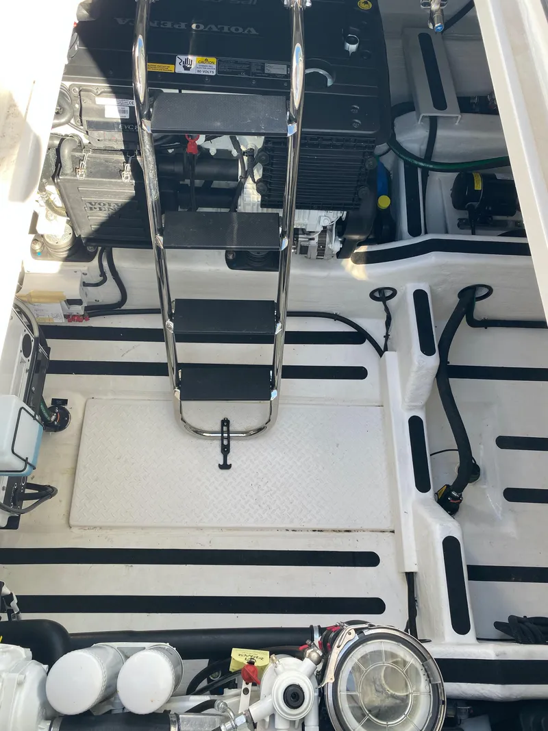 Slide: The Image of Interior of 2019 Sabre 45 Salon Express, featuring sleek cabinetry and modern design elements. - 53