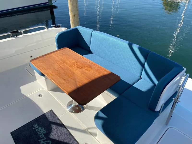 Slide: The Image of 2019 Sabre 45 Salon Express yacht docked, showcasing sleek design and luxurious interior. - 6