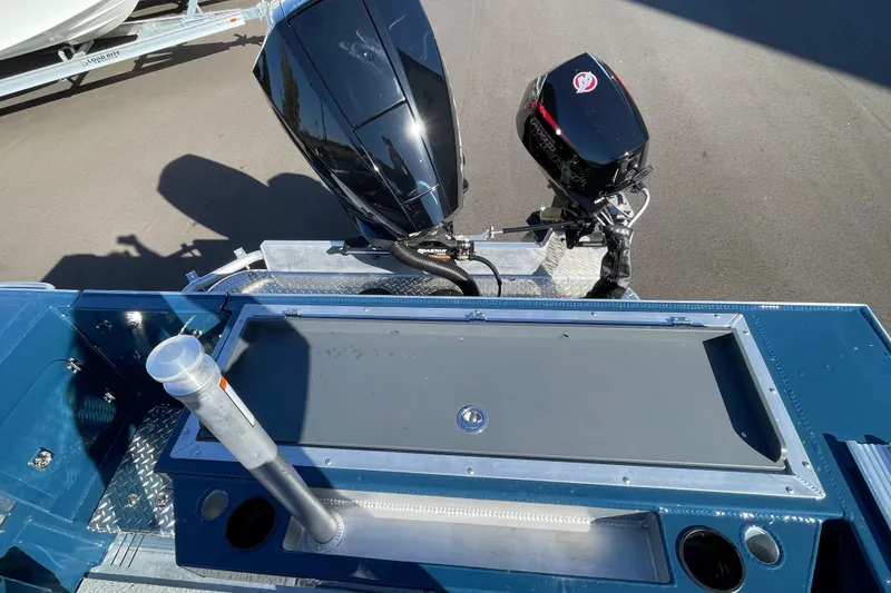 Slide: The Image of 2026 Hewescraft 210 Sea Runner ET with dual outboard motors, rear deck view. - 9