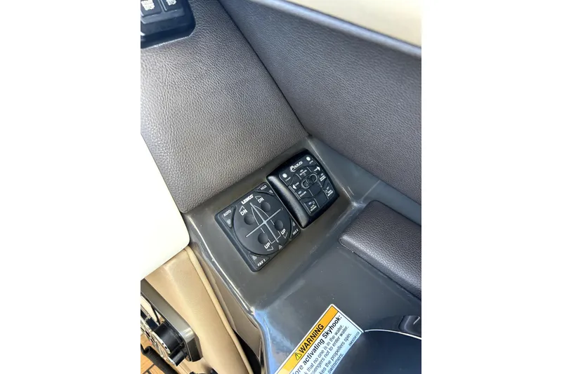 Slide: The Image of Control panel of a 2016 Sea Ray 350 SLX boat interior. - 7