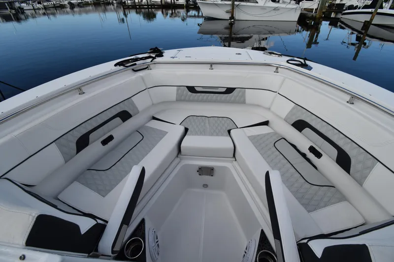 Slide: The Image of 2022 Blackfin 272DC boat interior with luxurious seating and elegant design. - 6