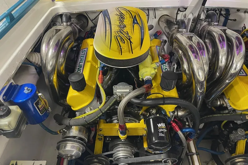 Slide: The Image of Engine of a 2002 Cigarette 38 Top Gun boat with Sterling components. - 14