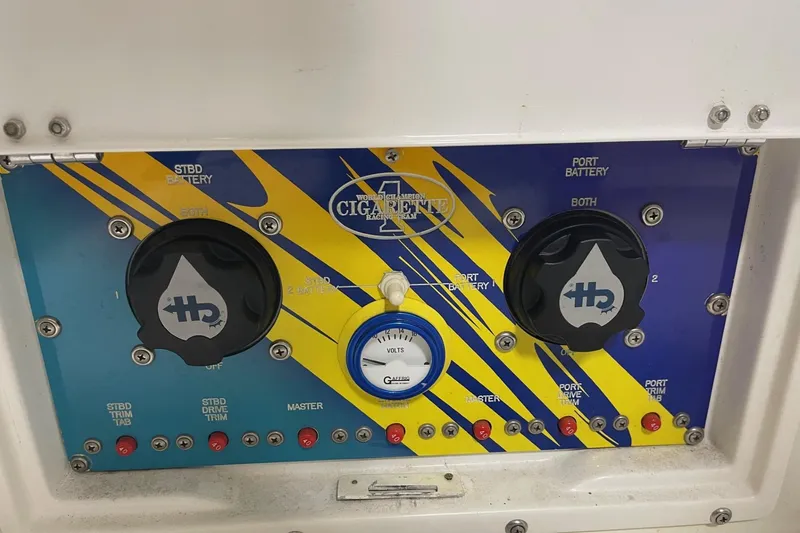Slide: The Image of Control panel of a 2002 Cigarette 38 Top Gun boat with battery switches. - 21