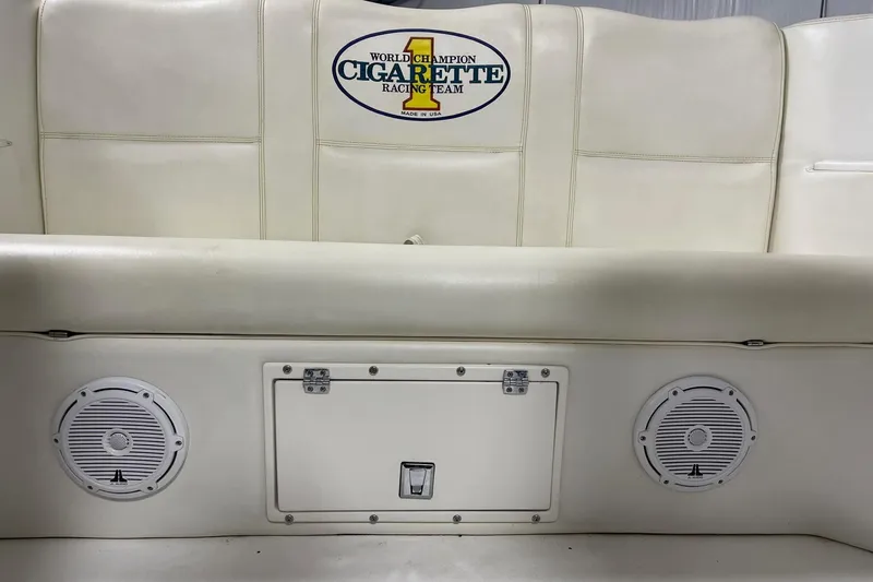 Slide: The Image of 2002 Cigarette 38 Top Gun boat interior with speakers and branded upholstery. - 22