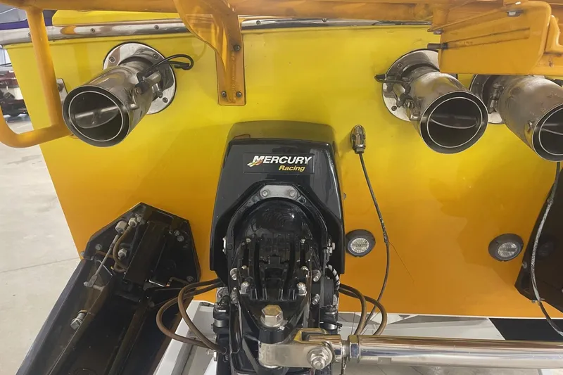 Slide: The Image of Rear view of a 2002 Cigarette 38 Top Gun boat with Mercury Racing engine. - 5