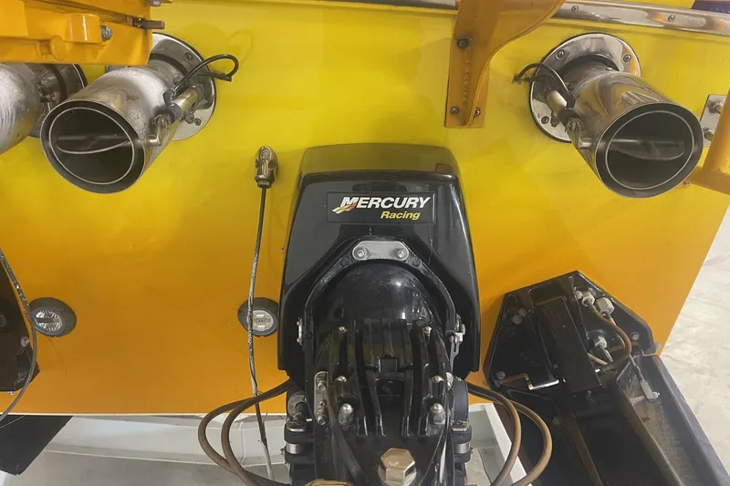 Slide: The Image of Rear view of a 2002 Cigarette 38 Top Gun with Mercury Racing engine components. - 6