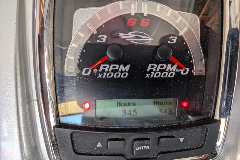 Slide: The Image of Close-up of 2012 Chaparral 327 SSX tachometer displaying RPM and engine hours. - 33