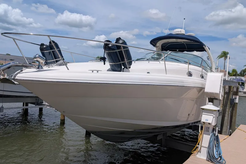 Slide: The Image of 2008 Sea Ray 340 Sundancer yacht docked, featuring sleek design and modern amenities. - 1