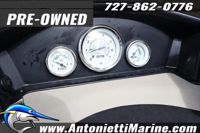 Slide: The Image of Pre-owned 2012 Harris FloteBote Cruiser CX 200 dashboard with fuel, RPM, and trim gauges. - 10