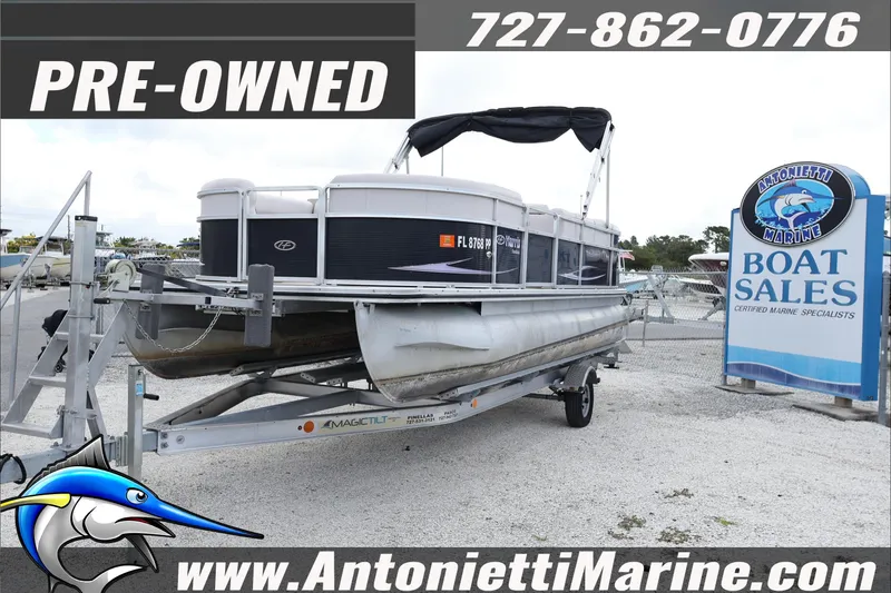 Slide: The Image of Pre-owned 2012 Harris FloteBote Cruiser CX 200 pontoon boat on trailer at Antonietti Marine. - 4