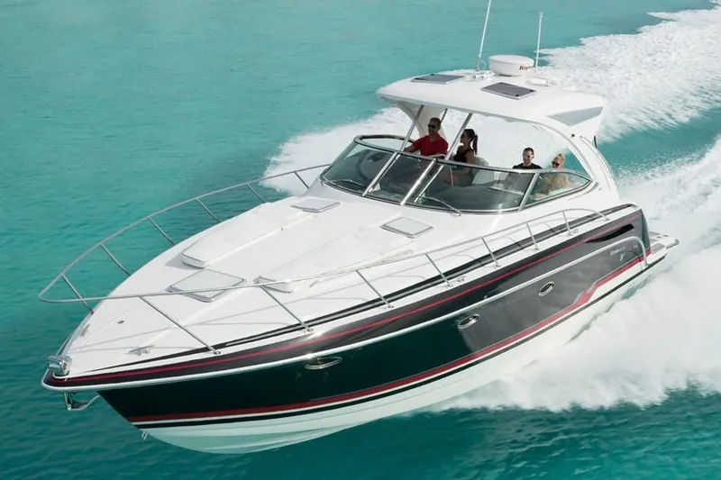 Slide: The Image of 2019 Formula 37 Performance Cruiser speeding on turquoise water. - 14